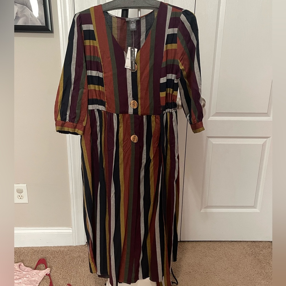 Multiple striped. Gold buttons. Dress.